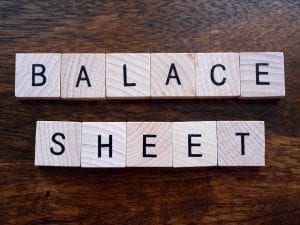 scrabble tiles that spell out "balance sheet"
