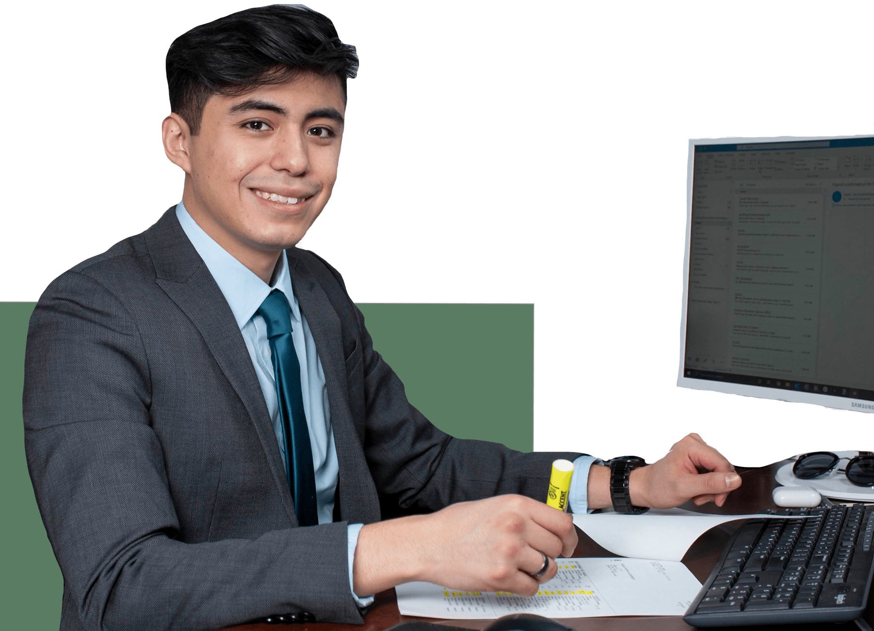 a professional at his desk with a computer